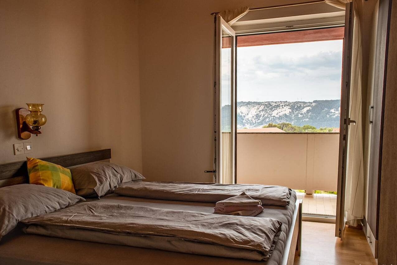 A-22978-a - Private accommodation - Apartments with a swimming pool Lopar, Rab