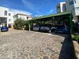 Rovinj, Rovinj, Parkering 23148 - Leiligheter og rom med en rullesteinstrand.