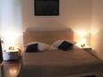 Pula, Bedroom in the apartment, air condition available and WiFi.
