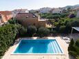 Kaštel Štafilić, Kaštela, Tuin 23473 - Appartementen met een kiezelstrand.