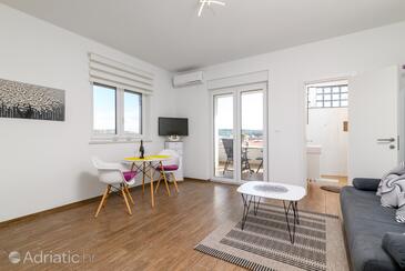 Pula, Living room in the apartment, air condition available and WiFi.