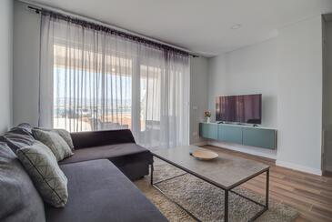 Nin, Sala de estar en alojamiento de tipo apartment, aire acondicionado disponible y WiFi.