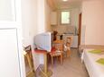 Podgora, Dining room in the studio-apartment, (pet friendly) and WiFi.