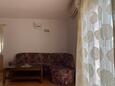 Betina, Living room in the apartment, air condition available, (pet friendly) and WiFi.