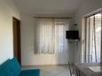 Betina, Living room in the apartment, air condition available, (pet friendly) and WiFi.