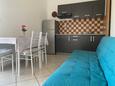 Betina, Living room in the apartment, air condition available, (pet friendly) and WiFi.