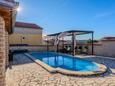 Posedarje, Novigrad, Courtyard 23728 - Vacation Rentals with pebble beach.