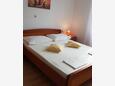 Lopar, Bedroom 1 in the apartment, air condition available, (pet friendly) and WiFi.