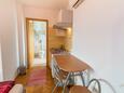 Baška, Dining room in the studio-apartment, air condition available and WiFi.