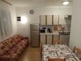 Rovanjska, Living room in the apartment, air condition available, (pet friendly) and WiFi.