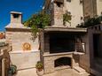 Bol, Brač, Courtyard 23848 - Apartments with pebble beach.