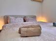 Malinska, Bedroom 1 in the apartment, air condition available, (pet friendly) and WiFi.