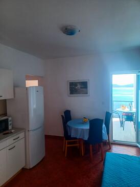 Pisak, Blagovaonica u smještaju tipa apartment, dostupna klima i WiFi.