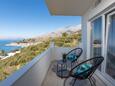 Podgora, Balcon dans l’hébergement en type house, avec la vue sur la mer, animaux acceptés et WiFi.