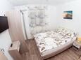 Biograd na Moru, Спальня в размещении типа apartment, доступный кондиционер и WiFi.