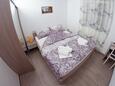 Biograd na Moru, Спальня в размещении типа apartment, доступный кондиционер и WiFi.