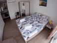 Biograd na Moru, Спальня в размещении типа studio-apartment, доступный кондиционер и WiFi.