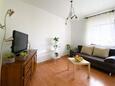Living room Sutivan, Living room in the apartment, air condition available, (pet friendly) and WiFi.
