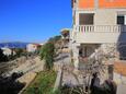 Trogir, Trogir, Courtyard 23979 - Apartments with pebble beach.