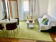 Korčula, Obývacia izba v ubytovacej jednotke apartment, klimatizácia k dispozícii a WiFi.