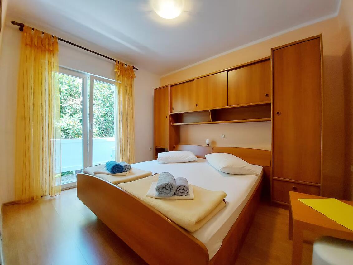 Apartmani s parkingom Palit, Rab - 24108
