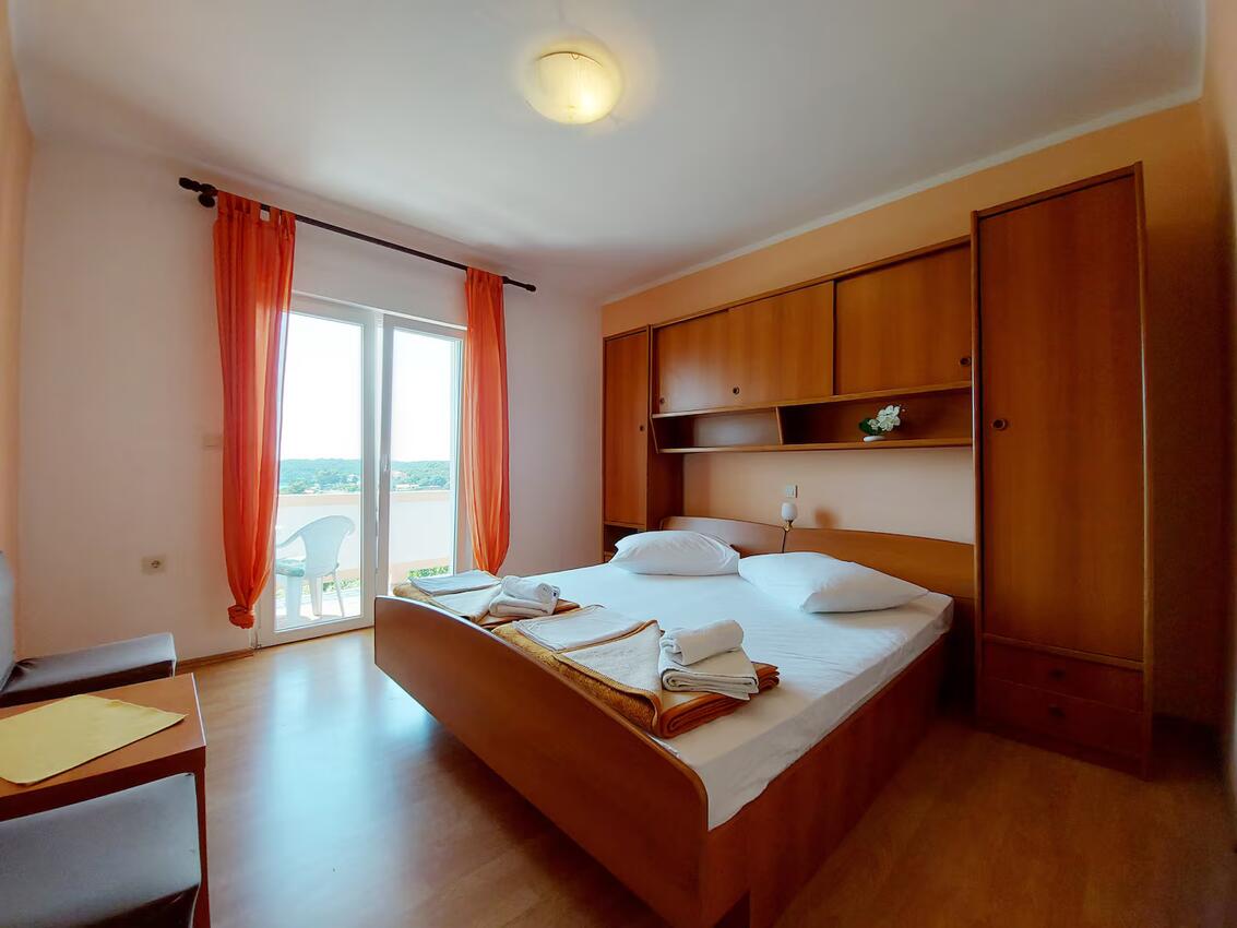 Apartmani s parkingom Palit, Rab - 24108