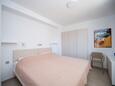 Novalja, Dormitorio en alojamiento de tipo apartment, aire acondicionado disponible y WiFi.