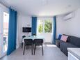 Novalja, Sala de estar en alojamiento de tipo apartment, aire acondicionado disponible y WiFi.