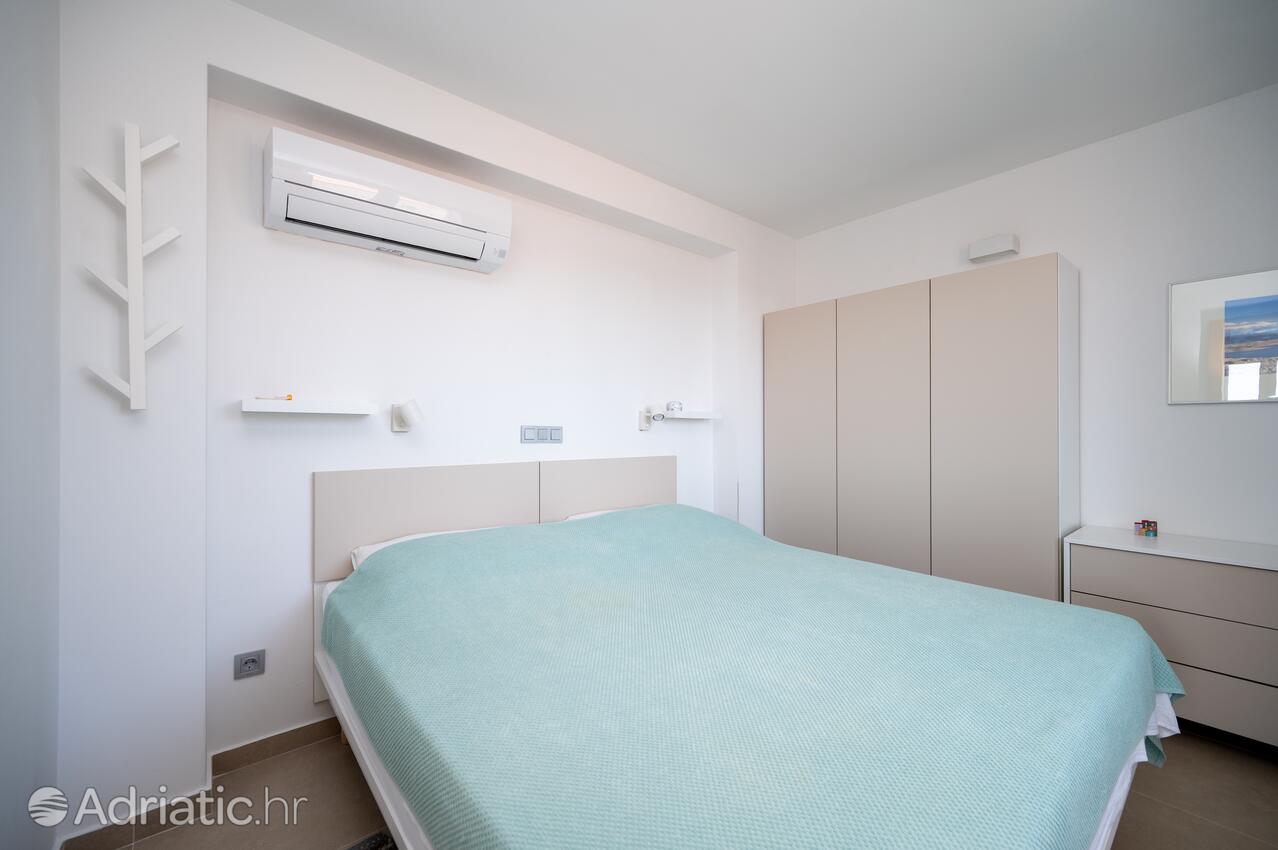Apartmani s parkingom Novalja, Pag - 24135