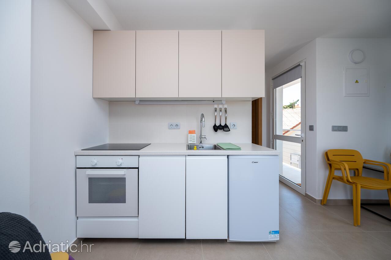 Apartmani s parkingom Novalja, Pag - 24135