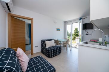 Novalja, Camera di soggiorno nell'alloggi del tipo apartment, condizionatore disponibile e WiFi.