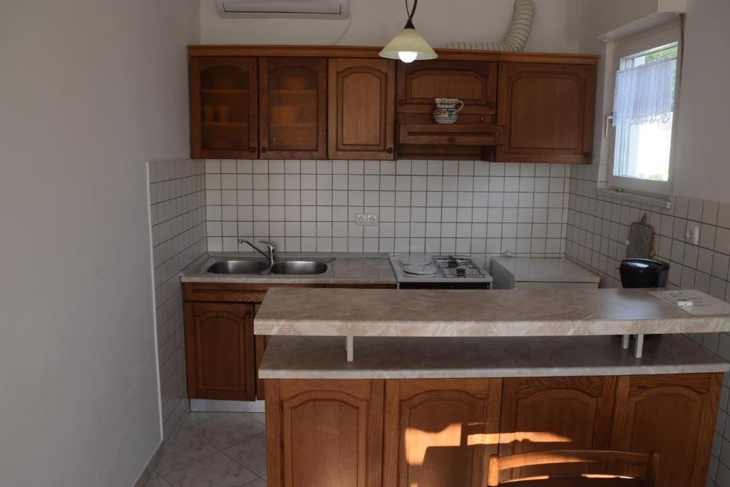 Apartmani uz more Barbat, Rab - 24277