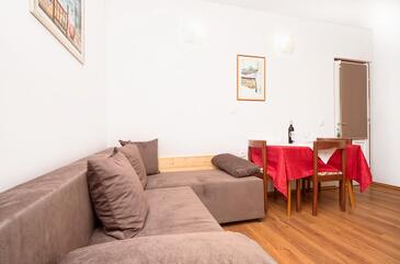 Živogošće - Blato, Living room in the apartment, air condition available and WiFi.