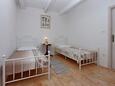 Grižane, Schlafzimmer 3 in folgender Unterkunftsart house, Klimaanlage vorhanden, Haustiere erlaubt und WiFi.