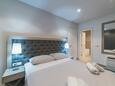 Trogir, Schlafzimmer 6 in folgender Unterkunftsart house, Klimaanlage vorhanden und WiFi.