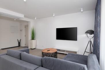 Poreč, Dnevni boravak u smještaju tipa apartment, dostupna klima i WiFi.
