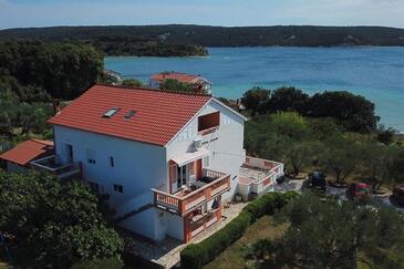 Supetarska Draga - Gonar, Rab, Obiekt 24383 - Apartamenty przy morzu z piaszczystą plażą.