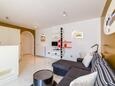 Baška, Wohnzimmer in folgender Unterkunftsart apartment, Klimaanlage vorhanden und WiFi.
