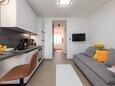 Baška, Obývací pokoj v ubytování typu studio-apartment, s klimatizací a WiFi.