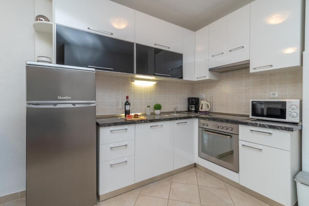 Appartamenti con piscina Seget Vranjica, Traù - Trogir - 24447