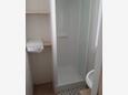 Pakovo Selo, Kupaonica u smještaju tipa apartment.
