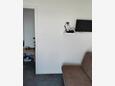 Sobra, Obývacia izba v ubytovacej jednotke apartment, klimatizácia k dispozícii a WiFi.