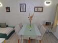 Veli Lošinj, Sala da pranzo nell'alloggi del tipo apartment, condizionatore disponibile e WiFi.