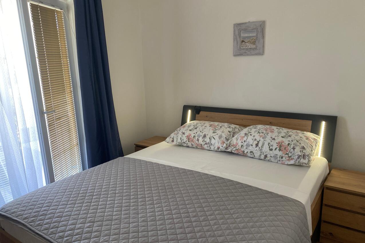 Ferienwohnungen mit Parkplatz Lopar, Rab - 24597