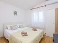 Rogoznica, Спальня 1 в размещении типа apartment, доступный кондиционер и WiFi.