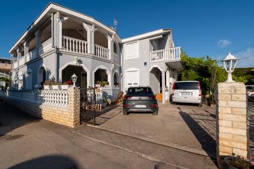 Sukošan, Zadar, Property 24601 - Apartments by the sea with pebble beach.
