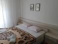 Banjol, Ložnice 3 v ubytování typu house, s klimatizací, domácí mazlíčci povoleni a WiFi.