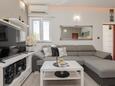Split, Living room in the apartment, air condition available and WiFi.