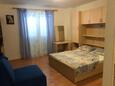 Tučepi, Camera da letto   nell'alloggi del tipo studio-apartment, condizionatore disponibile, animali domestici ammessi e WiFi.