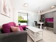 Malinska, Living room in the apartment, air condition available and WiFi.